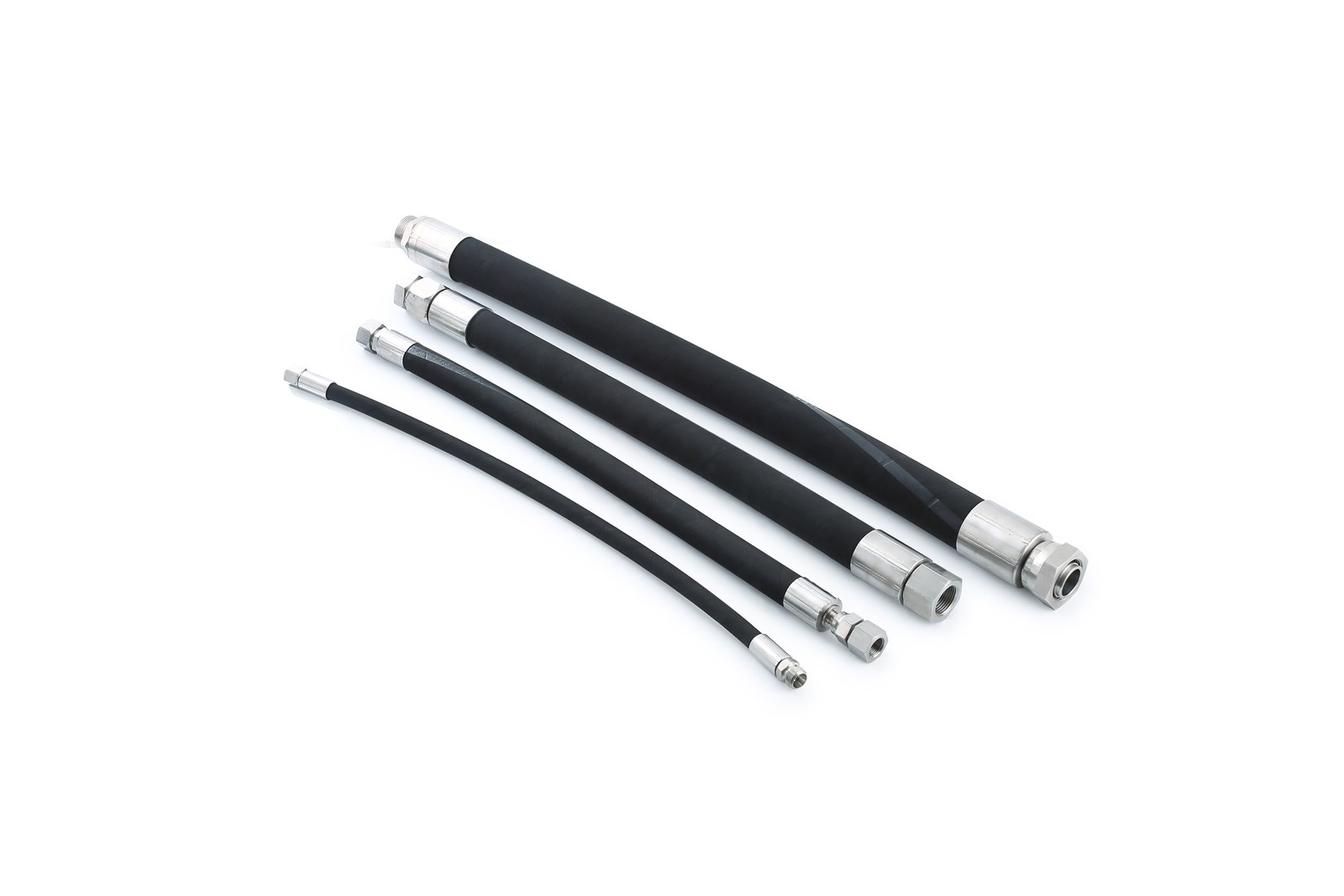 Representative hose assemblies with formed metal end fittings