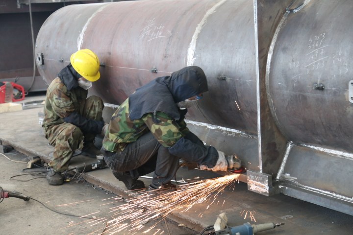 Surface preparation on a large fabricated metal structure