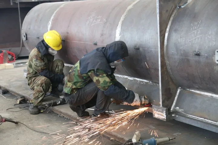 Surface preparation on a large fabricated metal structure